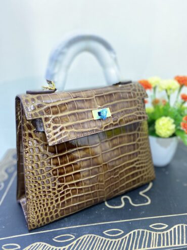 Brown croc styled ladies hand bag